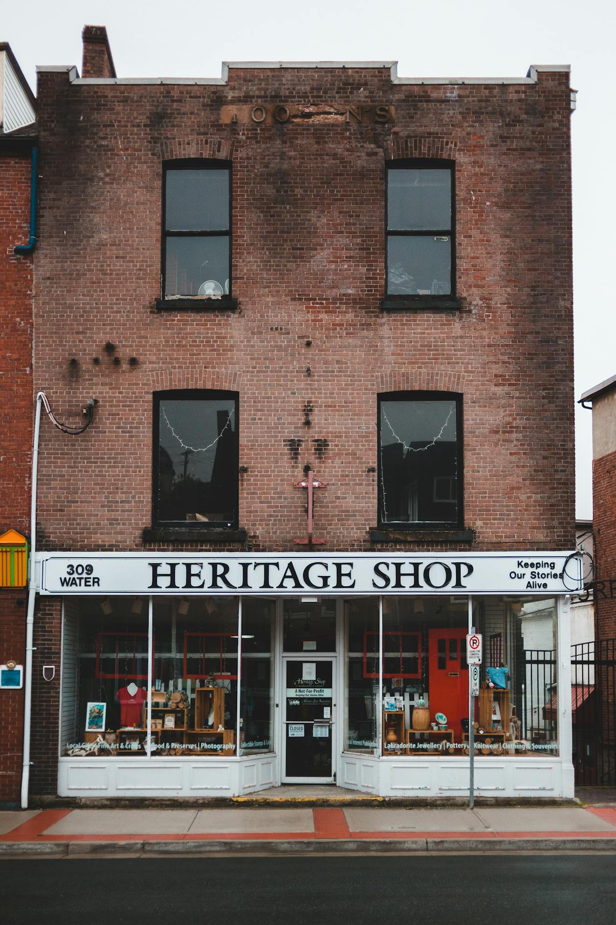 Quiet small town storefront setting for a cozy mystery with suspects and clues