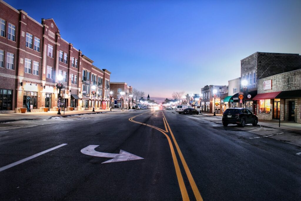 Twilight on a small town main street, the setting for a cozy mystery series